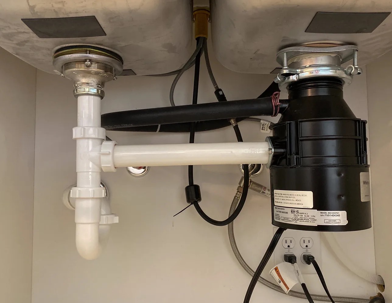 Leaky Garbage Disposal Cleanup in Fairview, TX